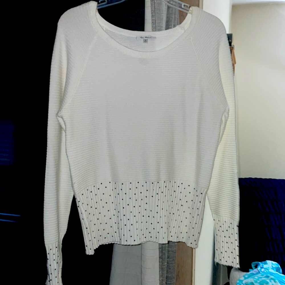 Nice sweater , new. Medium. Never worn.